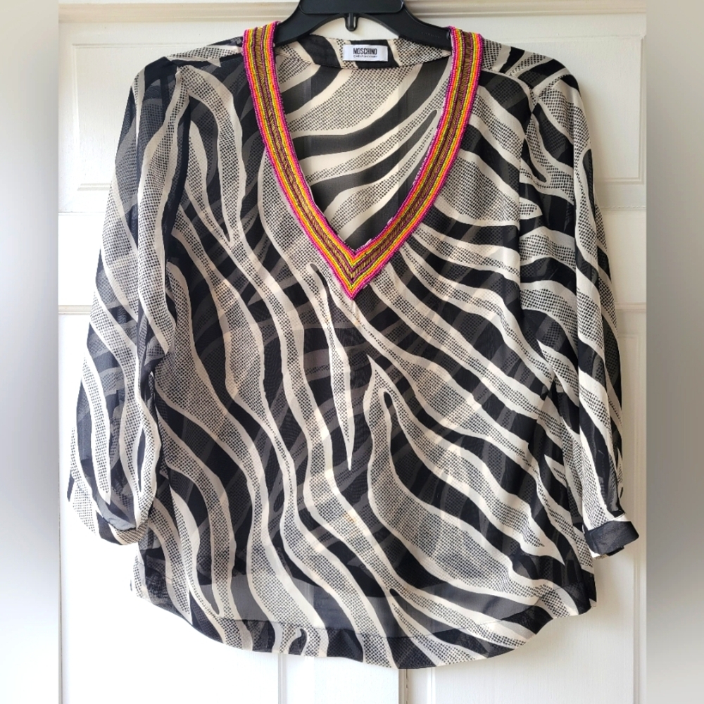 Sheer and beaded long sleeve blouse